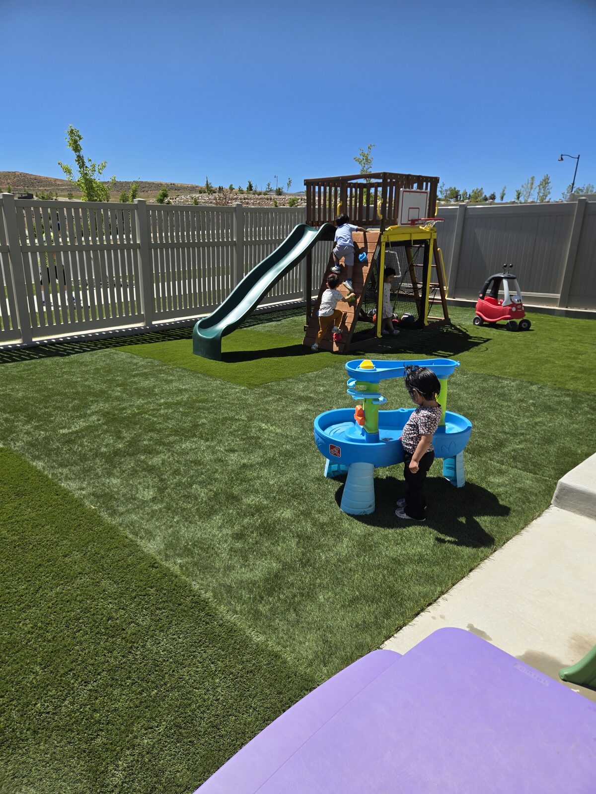 Children playing outside at Lina’s Child Care